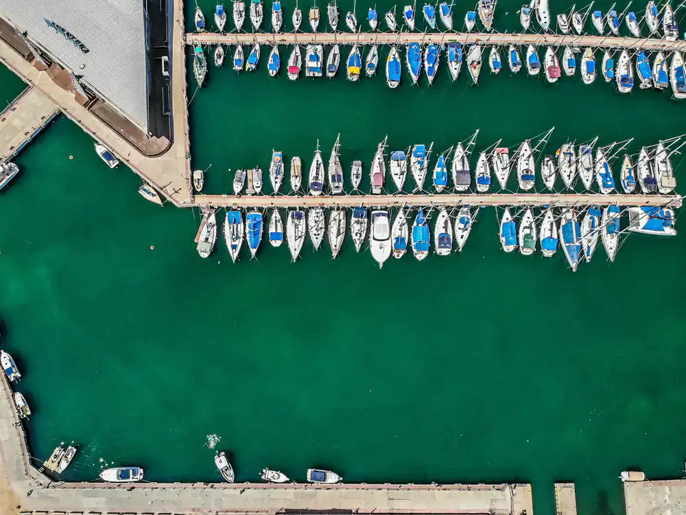 Our fleet of modern sailboats moored at the dock